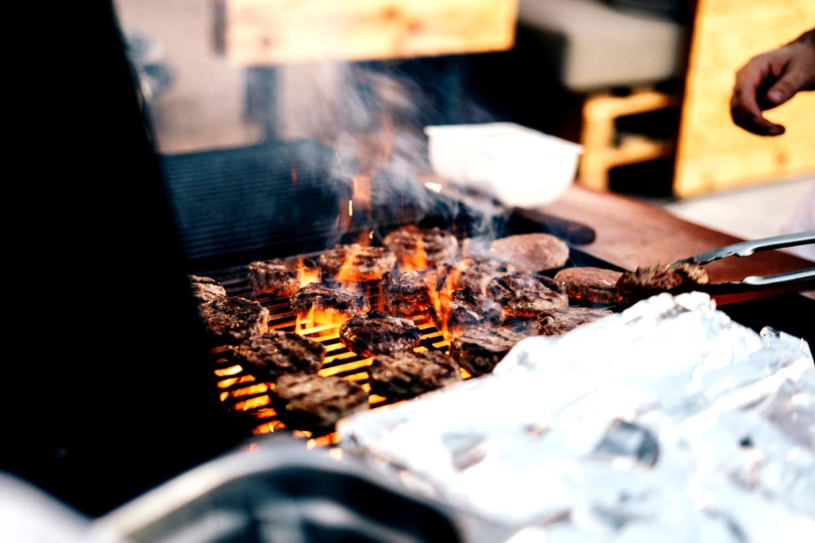 Group cooking session showing collaborative plant-based meal preparation