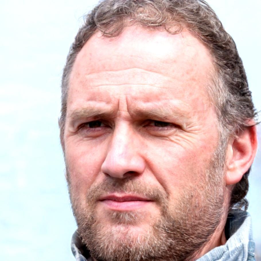 Instructor portrait showing experienced plant-based cooking educator